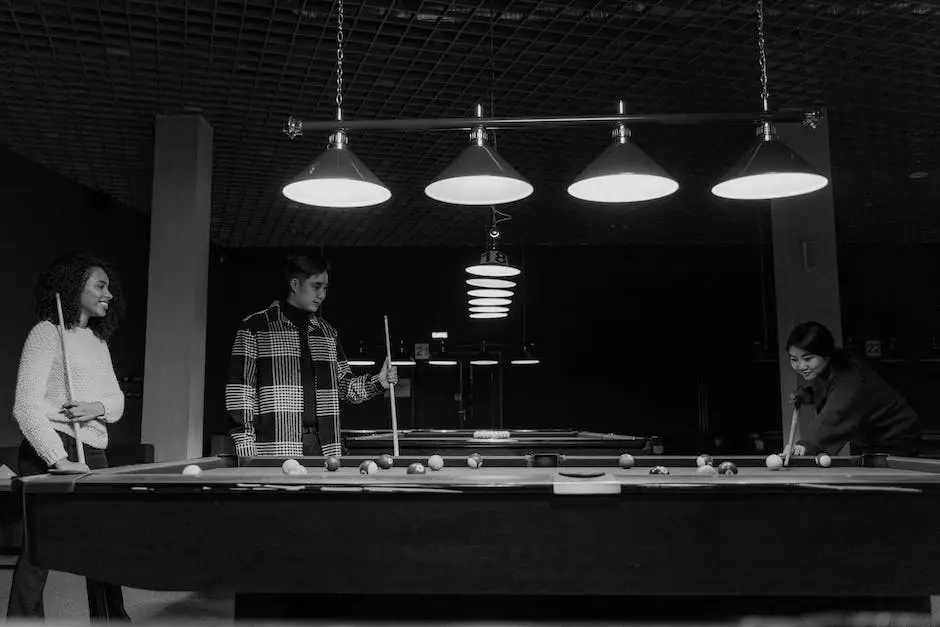 Image description: A person aiming and taking a shot on a billiards table.